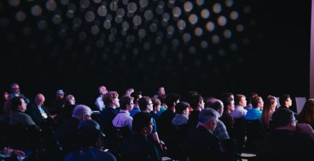 People seated attending a conference